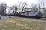 The 4102 and 5615 leading the train across Boyd St Xing